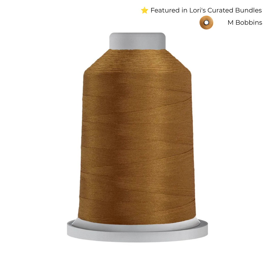 Glide 40 wt Military Gold (27407) 5000 m king cone trilobal polyester quilting thread.
