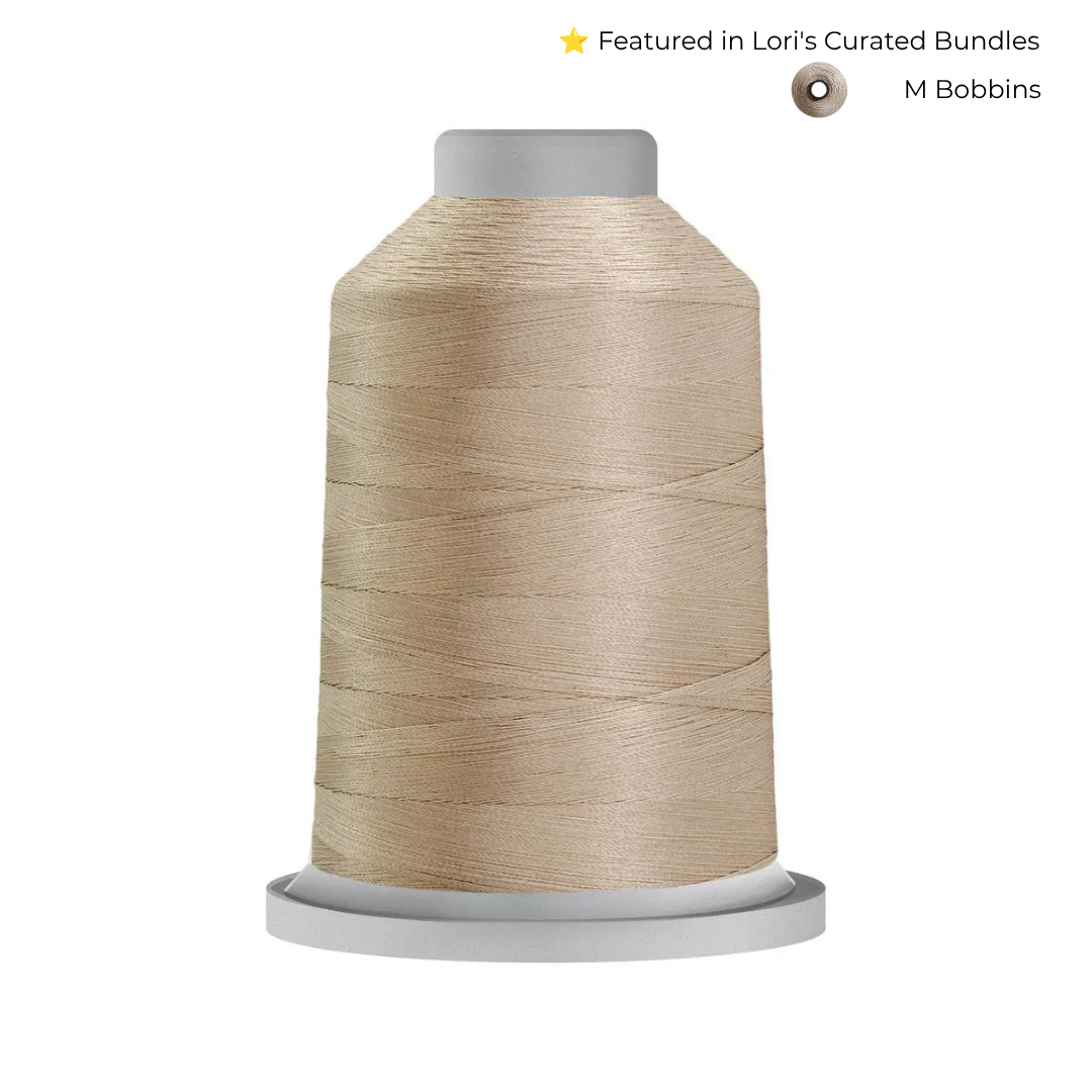 Glide 40 wt Warm Grey 4 (10WG4) 5000 m king cone trilobal polyester quilting thread.