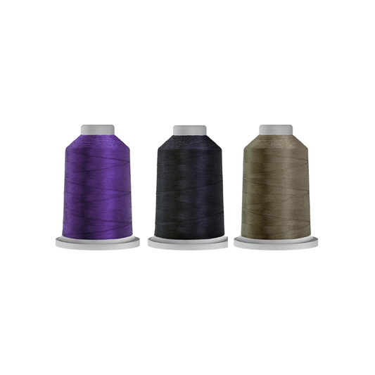 Dark Specialty Glide bundle featuring Raven, Blueberry, and German Granite quilting thread spools.