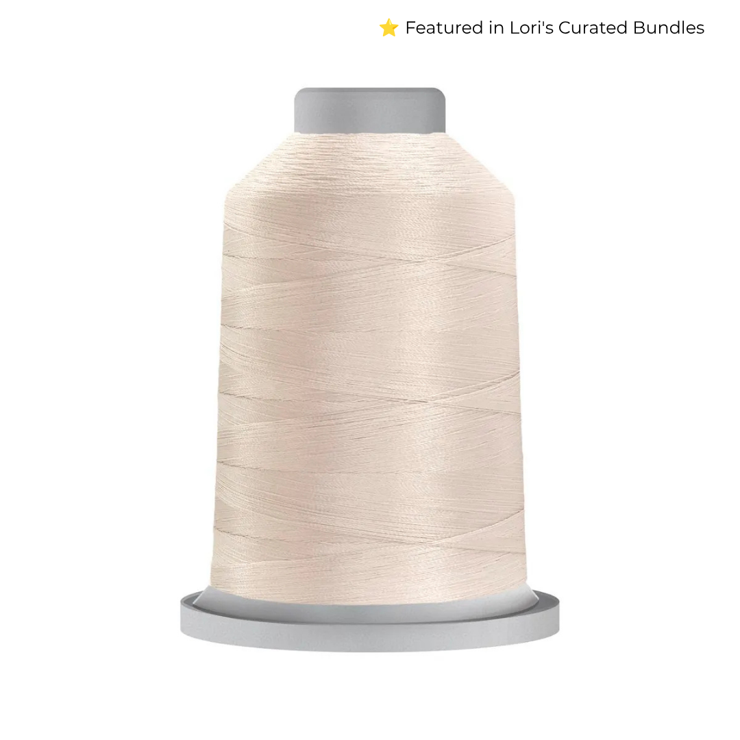 Glide 40 wt Bone (17443) 5000 m king cone trilobal polyester quilting thread.